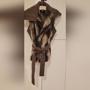 Faux fur and sweater material vest.